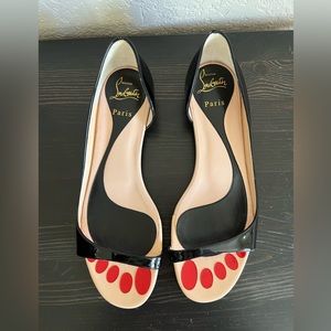 Black Christian Louboutin flat